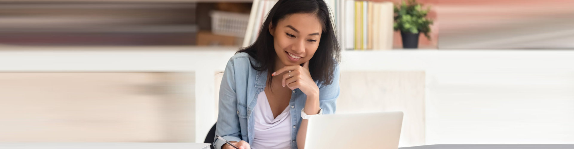 a gorgeous woman on a laptop